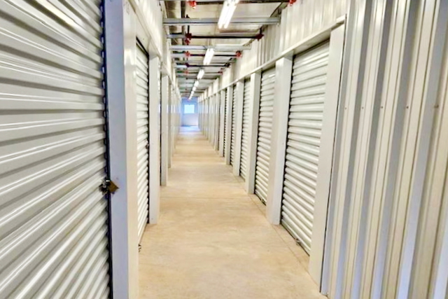 Indoor storage area at Space Savers Storage, 5811 Old Pascagoula Road, Mobile, AL, with climate control and ground floor access for easy storage.